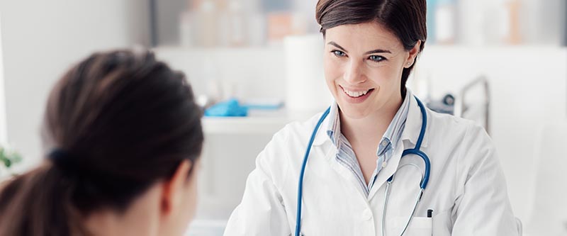A doctor smiles