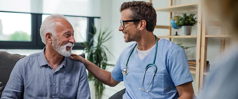 A doctor gives patient some support